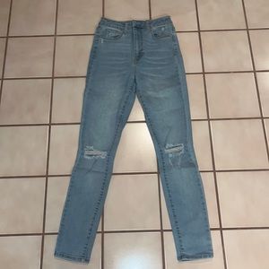 High rise light denim ripped skinny jeans